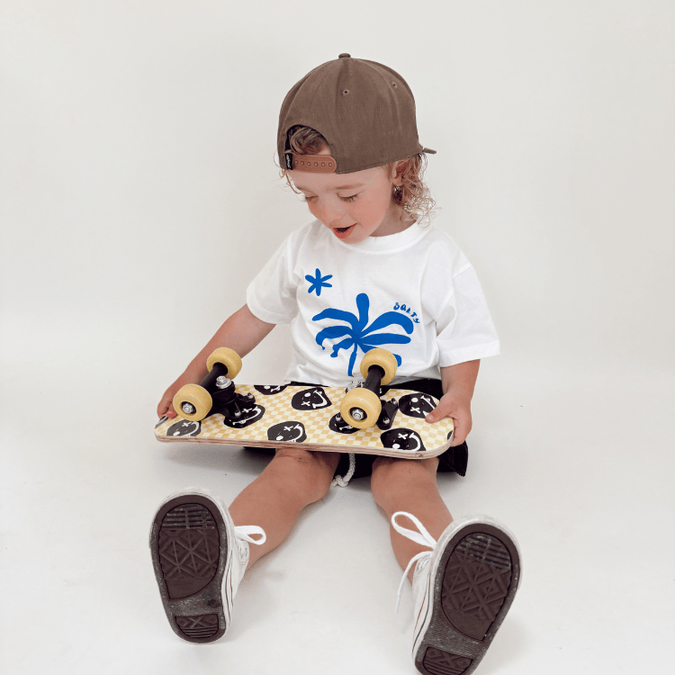 white toddler kids tshirt with beach vibes and palm tree, skateboard kid vibes, surf