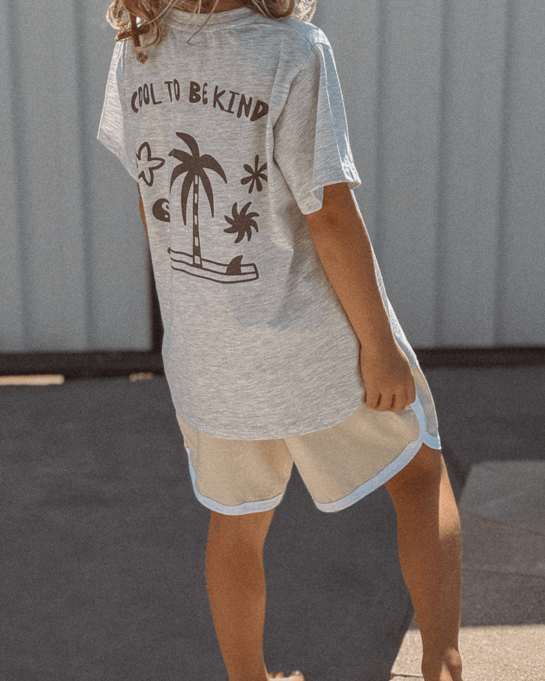 Kids t-shirt in light grey with Cool to be Kind graphic, eco cotton